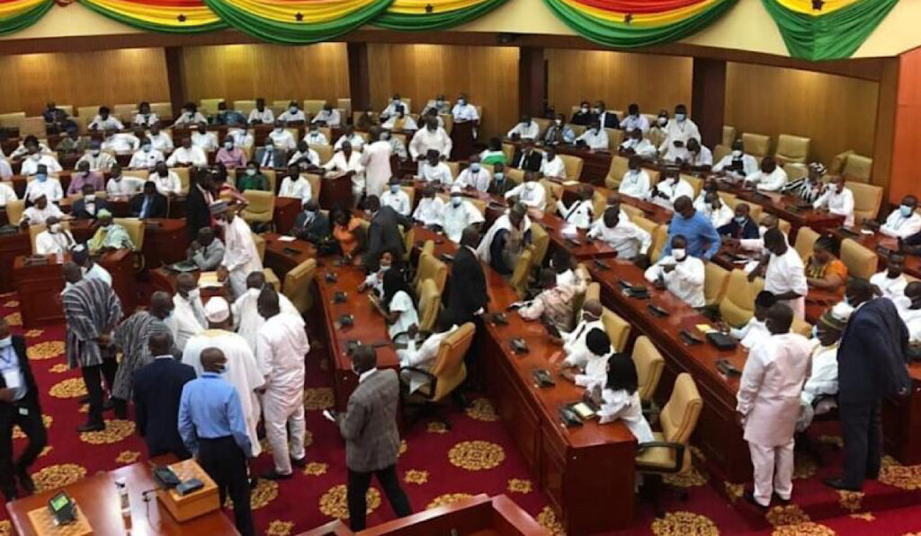 Ghana’s Parliament Erupts into Chaos as NDC MP whisks away Speaker’s seat